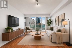 Toronto (Newtonbrook East) condo for rent - A living room with a large window overlooking a cityscape.