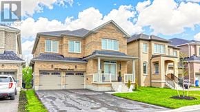 Shelburne apartment for rent - A large, well-maintained house with a driveway and a clear sky above.