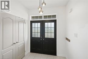 Niagara-On-The-Lake apartment for rent - A black double door with a glass window and a decorative grill design.