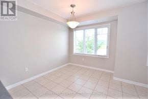 Milton (Sc Scott) townhouse for rent - A room with a window and a light fixture.