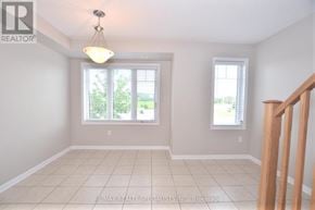 Milton (Sc Scott) townhouse for rent - A room with a window and a chandelier.