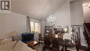 Hamilton apartment for rent - A dining room with a wooden table and chairs.