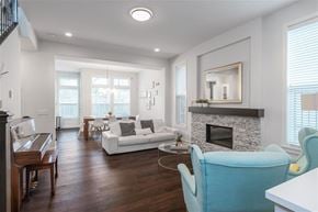 Surrey apartment for rent - A living room with a fireplace and a couch.