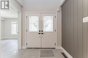 Newmarket (Woodland Hill) apartment for rent - A white door with a glass window is in a room with a grey wall.