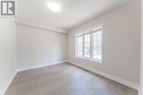 Newmarket (Woodland Hill) apartment for rent - A room with a window and wooden flooring.