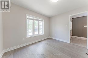 Newmarket (Woodland Hill) apartment for rent - A room with a window and a door.