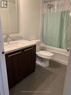 Toronto (Bay Street Corridor) house for rent - A bathroom with a toilet, sink, and shower.