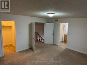 Hamilton (Stoney Creek) apartment for rent - A room with a white door and a light on the ceiling.