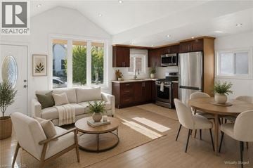 Hamilton apartment for rent - A modern kitchen with a dining table set for four.