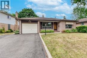 Oakville apartment for rent - A house with the number 1230 on the front.