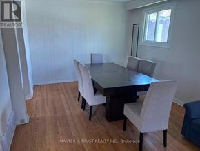 Toronto (West Hill) apartment for rent - A dining room with a table and chairs.
