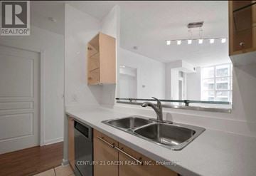 Toronto (Waterfront Communities) condo for rent - A kitchen with a sink and a window.