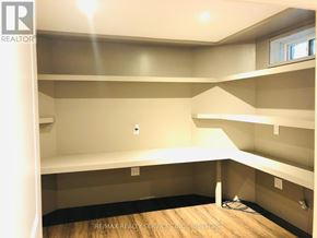 Mississauga (Mineola) apartment for rent - A room with a lot of empty space and a window.