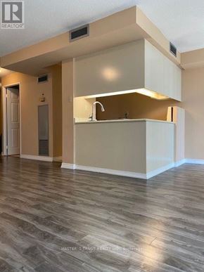 Toronto (Bay Street Corridor) condo for rent - A kitchen area with a sink and cabinets.