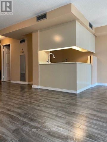 Toronto (Bay Street Corridor) condo for rent - A kitchen area with a sink and cabinets.