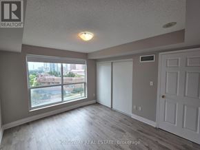 Toronto (Willowdale West) condo for rent - A room with a sliding glass door leading to a balcony.