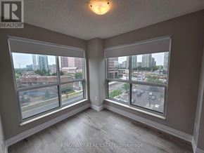 Toronto (Willowdale West) condo for rent - A room with a view of the city through large windows.