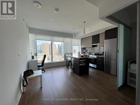 Toronto (Kensington-Chinatown) condo for rent - A modern kitchen with a view of the city.