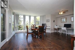 Toronto (Rouge) condo for rent - A dining room with a table and chairs is shown.