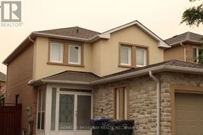 Mississauga (East Credit) apartment for rent - A room with a wooden floor and a doorway leading to another room.