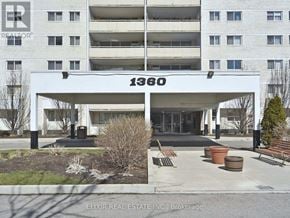 Toronto (Parkwoods-Donalda) condo for rent - The entrance to a building with the number 1360 on it.