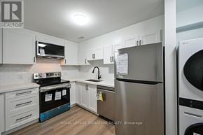 Ajax (Northwest Ajax) apartment for rent - A kitchen with a stainless steel refrigerator and oven.