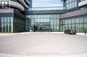 Vaughan (Steeles West Industrial) condo for rent - A car is parked in front of a glass building with a sign that says REALTOR.