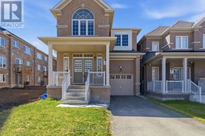 Oshawa (Taunton) apartment for rent - A large house with a garage is for sale.