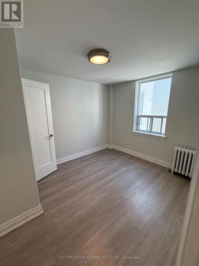 Toronto (Forest Hill South) house for rent - A room with a window and a radiator on the floor.