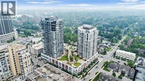 Waterloo condo for rent - A cityscape with tall buildings and a clear sky.