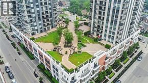 Waterloo condo for rent - A large green space surrounded by buildings.