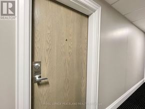 Whitchurch-Stouffville (Stouffville) condo for rent - A door with a number 307 on it is closed.