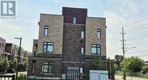 Pickering (Village East) townhouse for rent - A building with the words "World Class" on the front.