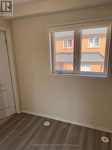 Markham (Cornell) apartment for rent - A room with a window and a door.