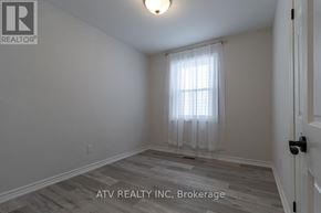 Mississauga (Lakeview) apartment for rent - A room with a window and a door.