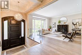 Toronto (Willowdale West) apartment for rent - A living room with a black door and a white couch.