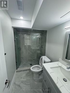 Caledon apartment for rent - A white bathroom with a toilet, sink, and shower.