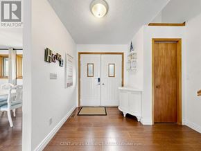 Kawartha Lakes (Carden) apartment for rent - A hallway with a white door and a brown door.