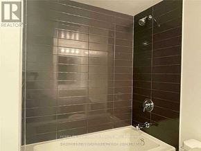 Toronto (Cabbagetown-South St. James Town) condo for rent - A bathroom with a shower and a sink.
