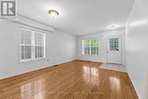 Markham (Wismer) apartment for rent - A kitchen with a refrigerator and a sink.