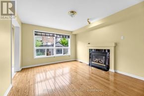 Markham (Wismer) apartment for rent - A bedroom with two beds and a window with curtains.