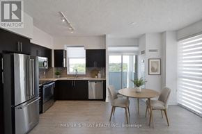 Oakville (Co Central) condo for rent - A modern kitchen with a dining table and chairs.