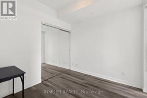 Toronto (Niagara) condo for rent - A room with a sliding door and a table.