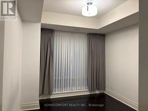 Markham (Unionville) condo for rent - A room with a striped curtain and a light on the ceiling.