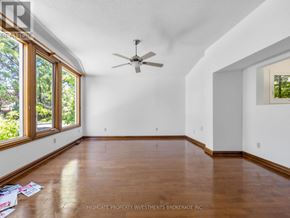 Pickering (Amberlea) apartment for rent - A room with a ceiling fan and wooden flooring.