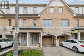 Oakville (Wm Westmount) townhouse for rent - A house with a car parked in front of it.
