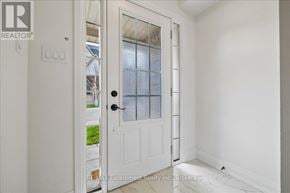 Oakville (Wm Westmount) townhouse for rent - A white door with a glass window is open.