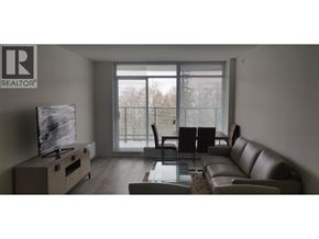 Burnaby apartment for rent - A living room with a couch, chairs, and a television.