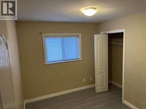 Burnaby apartment for rent - A room with a window and a door.