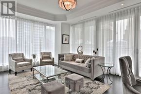 Toronto (Annex) condo for rent - A living room with a glass table and a grey sofa.